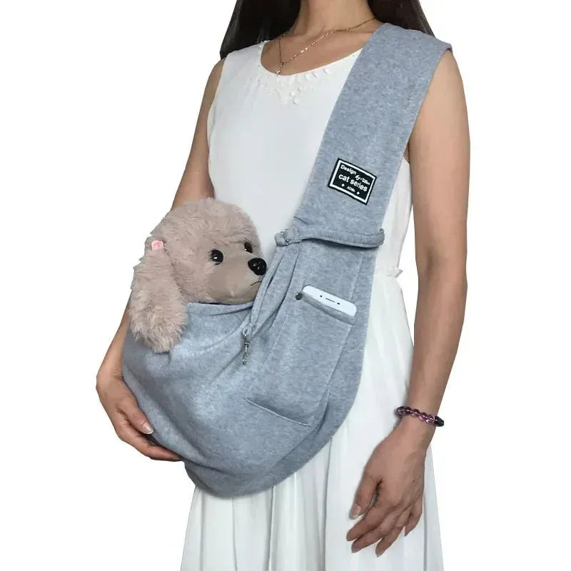 Side view of crossbody sling showing strap width and pet comfort