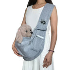 Side view of crossbody sling showing strap width and pet comfort
