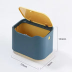Blue cat litter waste bin open showing yellow interior with dimensions labeled